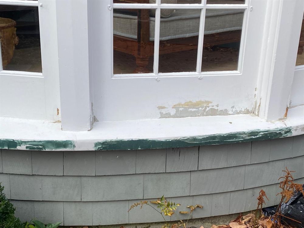 Bay window sill patched and spot-primed before painting